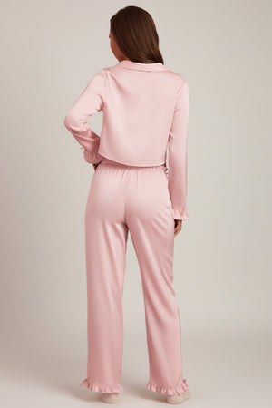 Oh Polly's Hayley wearing the Priti Trousers in Baby Pink Satin fabric perfect for brunch with friends