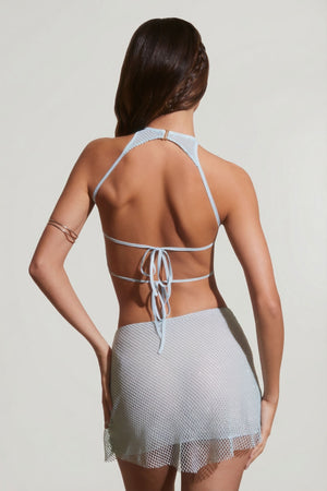 Oh Polly's Lini wearing the Raya Mini Skirt in Aqua Rhinestone fabric perfect for birthday celebrations