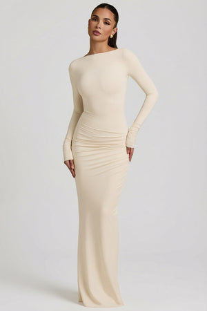 Oh Polly's Leidy wearing the Regine Maxi Dress in Ivory Modal fabric perfect for summer garden parties