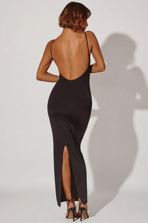 Oh Polly's Cristal wearing the Ryatt Maxi Dress in Black Slinky fabric perfect for a cocktail party
