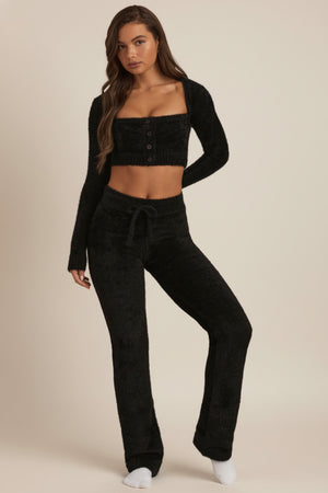 Oh Polly's Hayley wearing the Safia Trousers in Black fabric perfect for clubbing nights