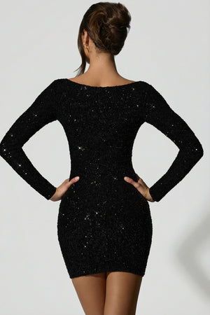 Oh Polly's Anna wearing the Sephina Mini Dress in Black Micro Sequin fabric perfect for a night out