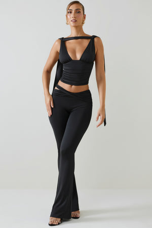 Oh Polly's Priscilla wearing the Shadi Trousers in Black Jersey fabric perfect for a night out
