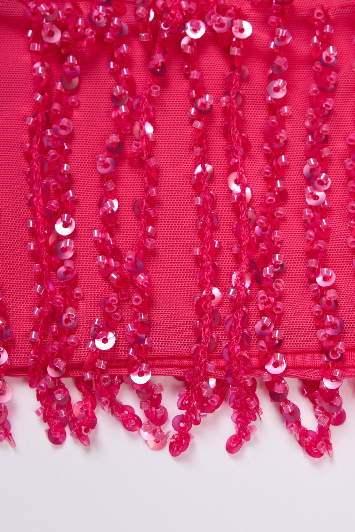 Fringed Low-Rise Mini Skirt in Raspberry