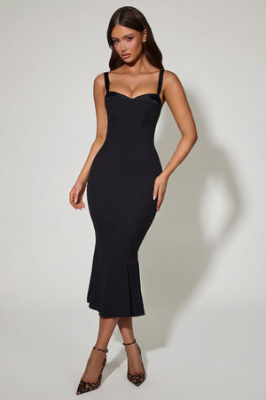 Oh Polly's Ella wearing the Valentina Midaxi Dress in Black Stretch Georgette fabric perfect for holiday celebrations