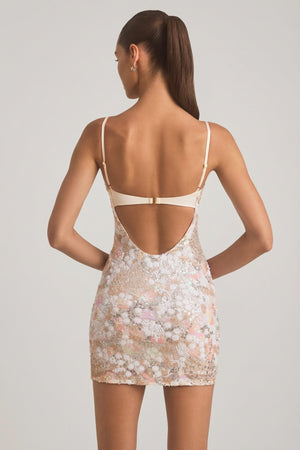 Oh Polly's Anna wearing the Velena Mini Dress in Ivory Coral Artisan Chiffon fabric perfect for beachside brunches