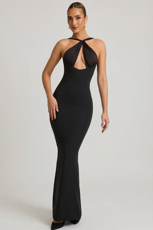 Oh Polly's Priscilla wearing the Xanthia Maxi Dress in Black Satin fabric perfect for upscale celebrations