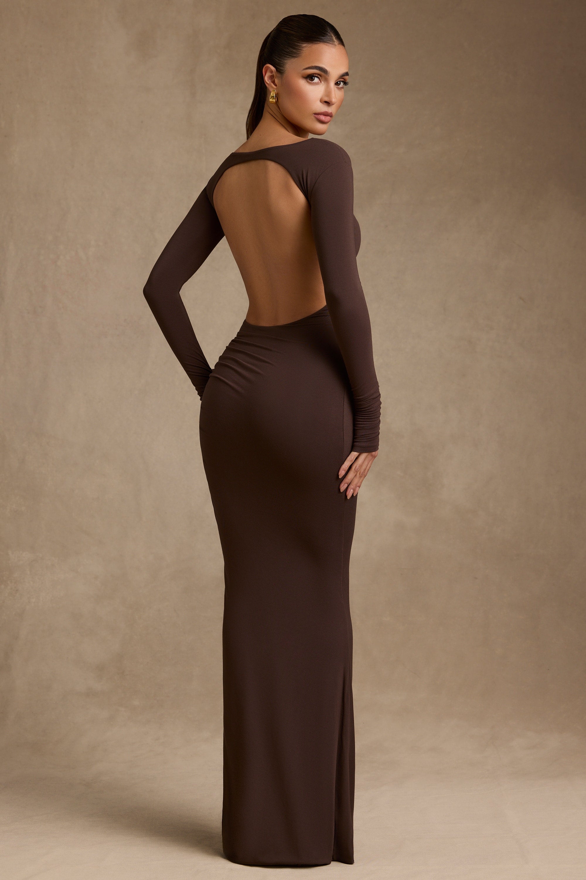 Maxi dress with brown checkered pattern, retro pockets, and elegant lapel details