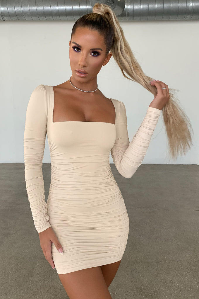 https://www.ohpolly.com/cdn/shop/products/1819-1-flatter-me-oyster-white-ruched-scoop-back-long-sleeve-mini-dress_1.jpg?v=1645124035&width=680