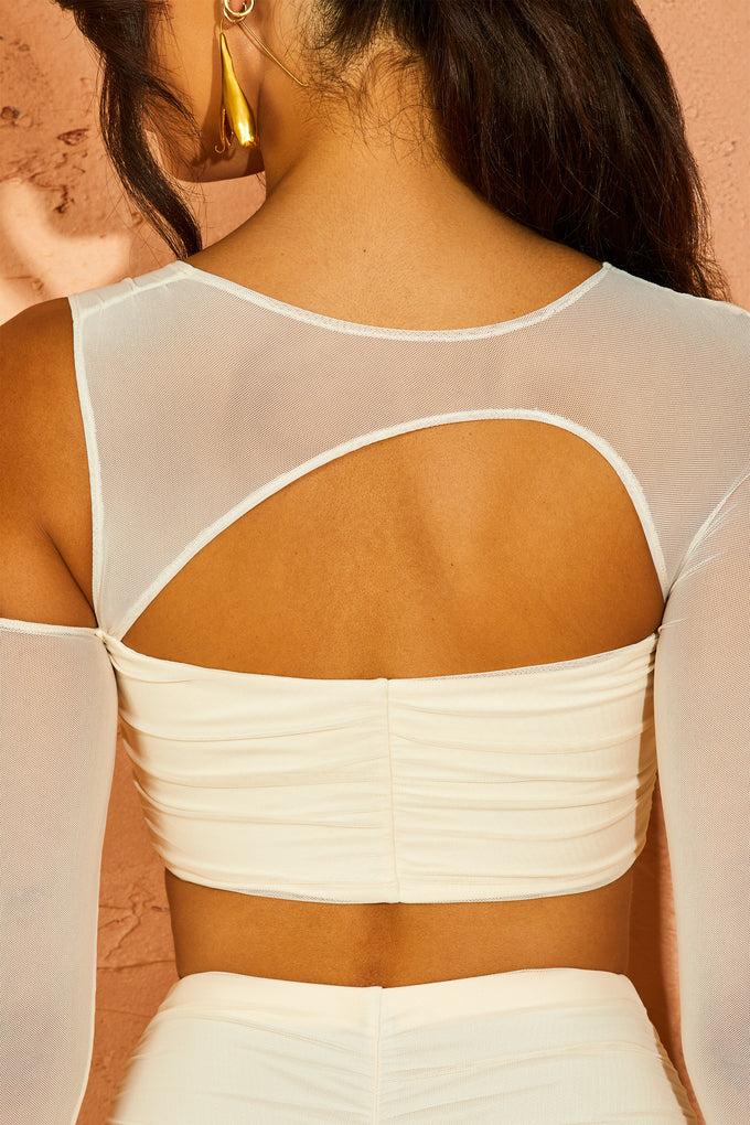 Back view of Asymmetric Cowl Neck Cut Out Crop Top in Ivory