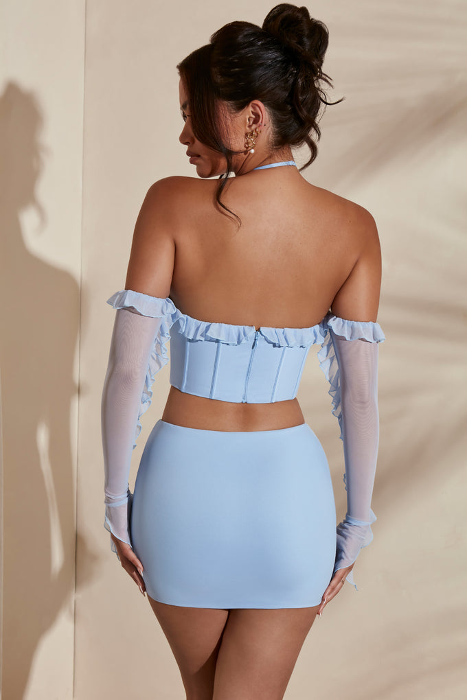 Back view of micro mini in light blue with pull on design.