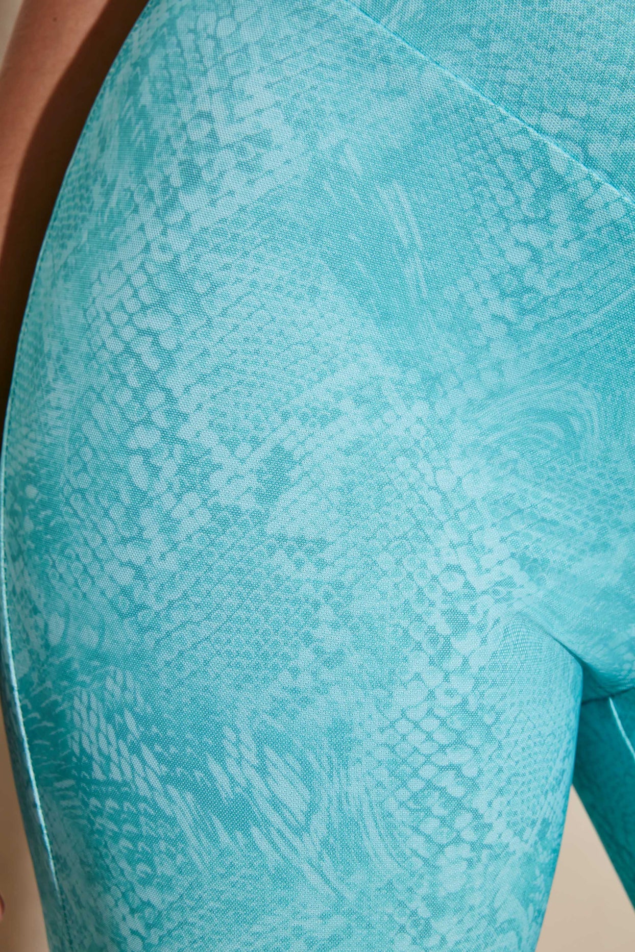 Close up of Teal Print in our soft light weight mesh fabric.