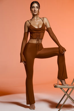 Wysokie spodnie z rozcięciem w kolorze brązowym