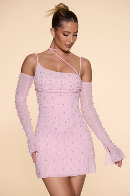 Mini-robe corset asymétrique ornée en blush