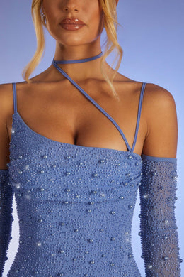 Ozdobiona asymetryczna sukienka mini z gorsetem w kolorze jasnoniebieskim
