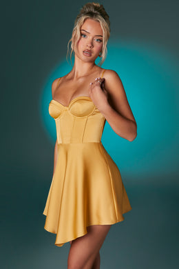 Złota sukienka mini z gorsetem i asymetrycznym dołem
