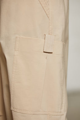 Spodnie cargo z szerokimi nogawkami w kolorze beżowym