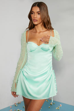 Zdobiona sukienka mini o linii A z długim rękawem w kolorze miętowym