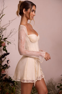 Mini-robe corset en dentelle à manches longues en ivoire