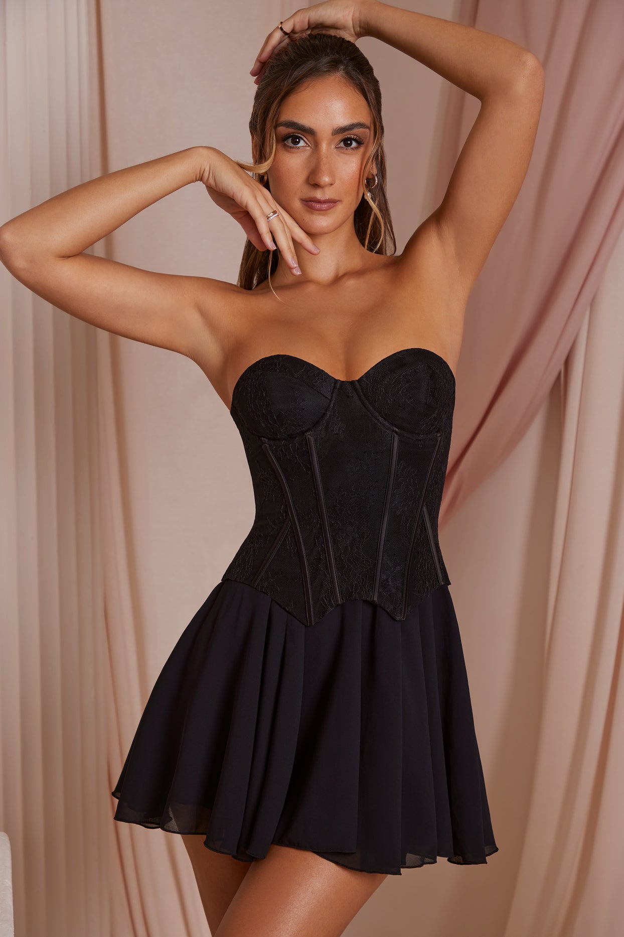 https://www.ohpolly.com/cdn/shop/products/6731_4_Chloe-Black-Strapless-Lace-Corset-Circle-Skirt-Mini-Dress.jpg?v=1680173120&width=1244