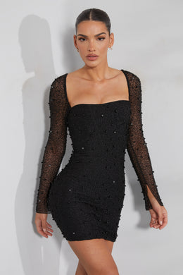 Czarna, zdobiona gorsetowa sukienka mini z długim rękawem