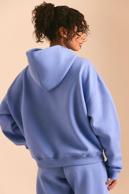 Obszerna bluza z kapturem w kolorze błękitu cerulejskiego