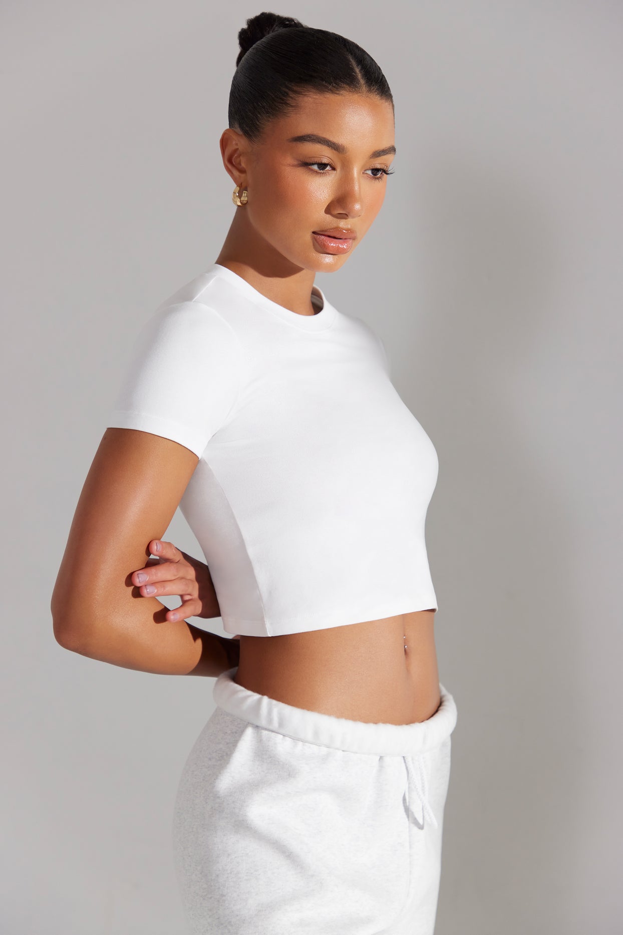 Essence Cap Sleeve Baby Tee in White | Oh Polly