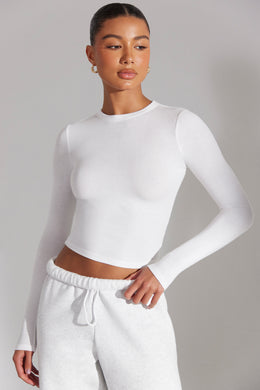 Elementary High Neck Long Sleeve Top in White | Oh Polly