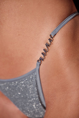 Trójkątne stringi od bikini w kolorze niebieskim