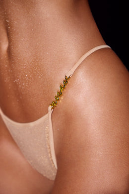 Trójkątny dół od bikini typu stringi w kolorze złotym