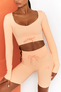 Time Check Ribbed Long Sleeve Crop Top in Peach
