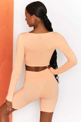 Time Check Ribbed Long Sleeve Crop Top in Peach