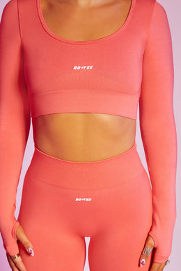 Reignited Seamless Long Sleeve Scoop Neck Crop Top in Coral